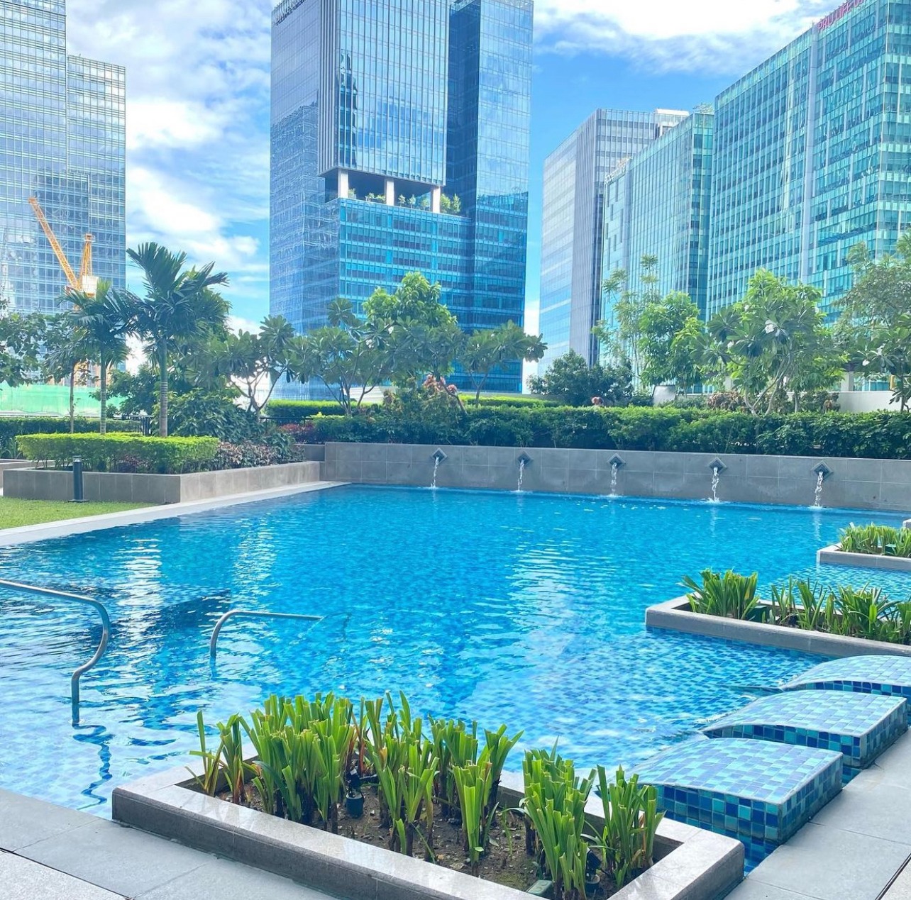 Uptown BGC pool and city skyline